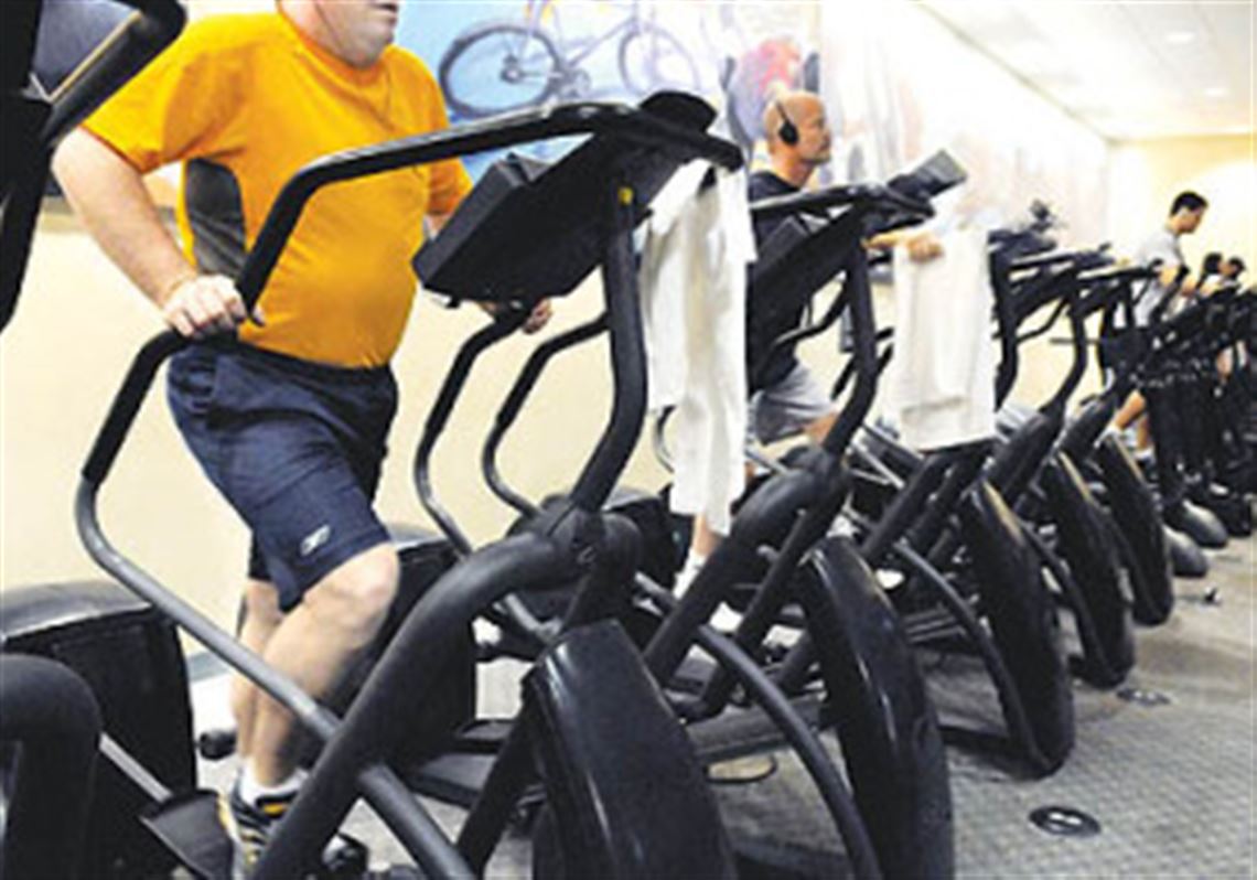Jay Crown, 36, of Fox Chapel, uses the StairMaster at Bally's Downtown.