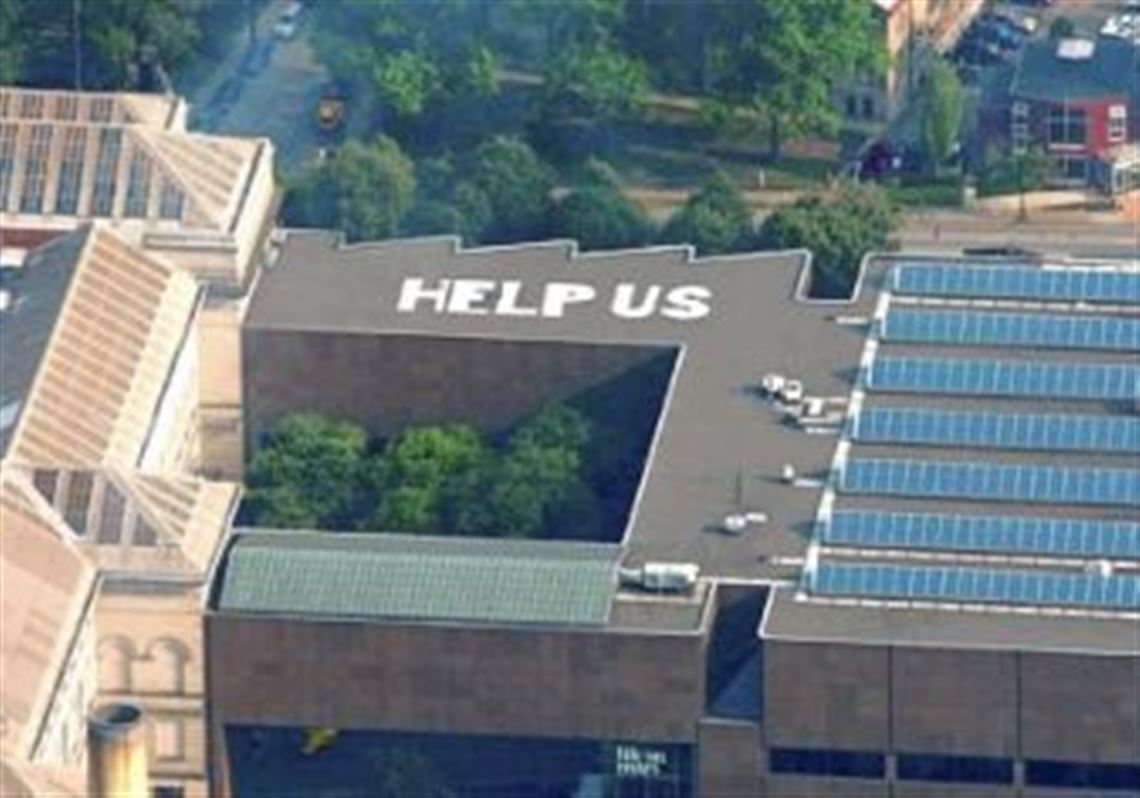 Carnegie International 2008 artist Mark Bradford's "Help Us," on the roof of Carnegie Museum of Art's sawtooth galleries, is 20 feet by 77 1/2 feet and made of white stone. Bradford will speak at the museum Oct. 11.