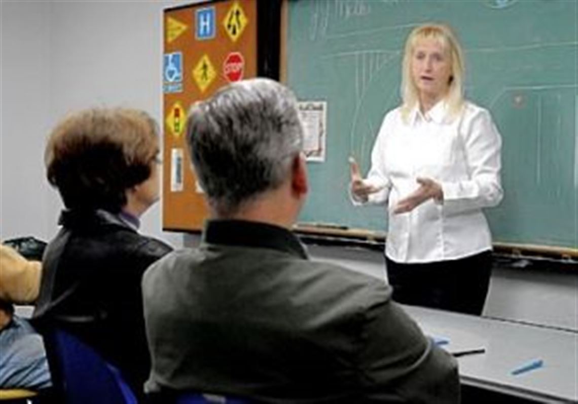 J.J. Miller, safety adviser for the American Automobile Association, teaches the defensive driver training class for mature drivers at the AAA office in Bethel Park. The two-day class helps adults with their skills and gives them a 5 percent reduction on their car insurance.
