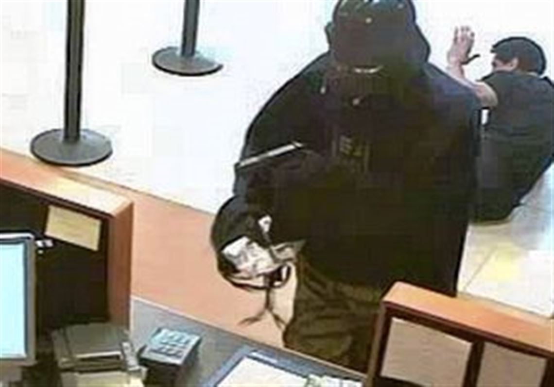 A surveillance camera caught this image of a robber dressed as Darth Vader when he held up a Chase bank in Setauket, N.Y., on Thursday.