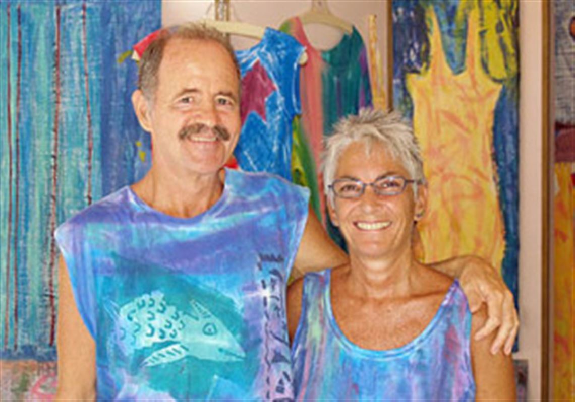 Terry McKoy and Barbara Alperen wearing some of his creations for Sloop Jones Studio in St. John, U.S. Virgin Islands.