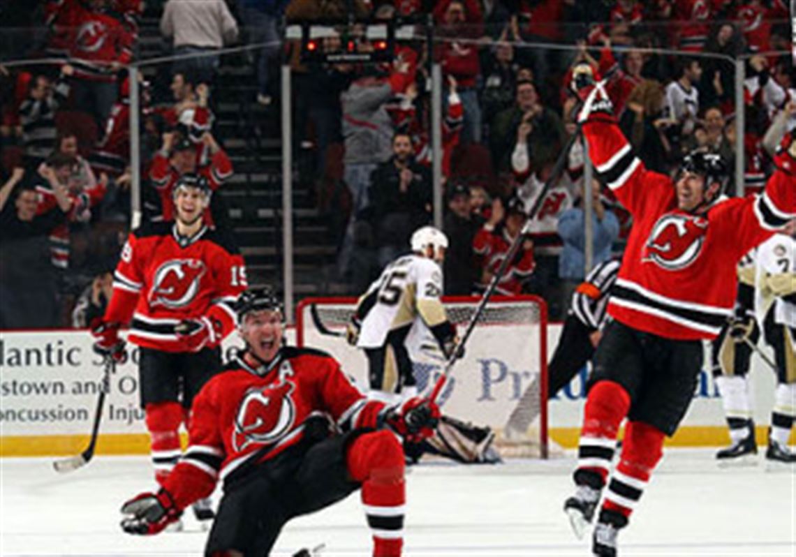 Devils forward Ilya Kovalchuk celebrates his overtime goal against the  Penguins with teammates, Travis Zajac and Brian Rolston at  at the Prudential Center in Newark, N.J. Friday.