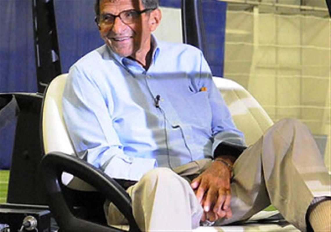Penn State football head coach Joe Paterno addresses to the media from a golf cart Aug. 16 during media day. The veteran coach may not be on the sideline during Saturday's season opener.