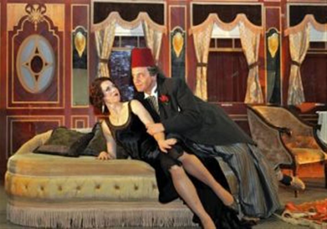 Konstanze, played by Lisette Oropesa, has been "given" to Osmin, Paolo Pecchioli, as a gift from the Pasha, but she rebuffs his advances, in the Pittsburgh Opera production of Mozart's "The Abduction From the Seraglio," set on the Orient Express luxury train.