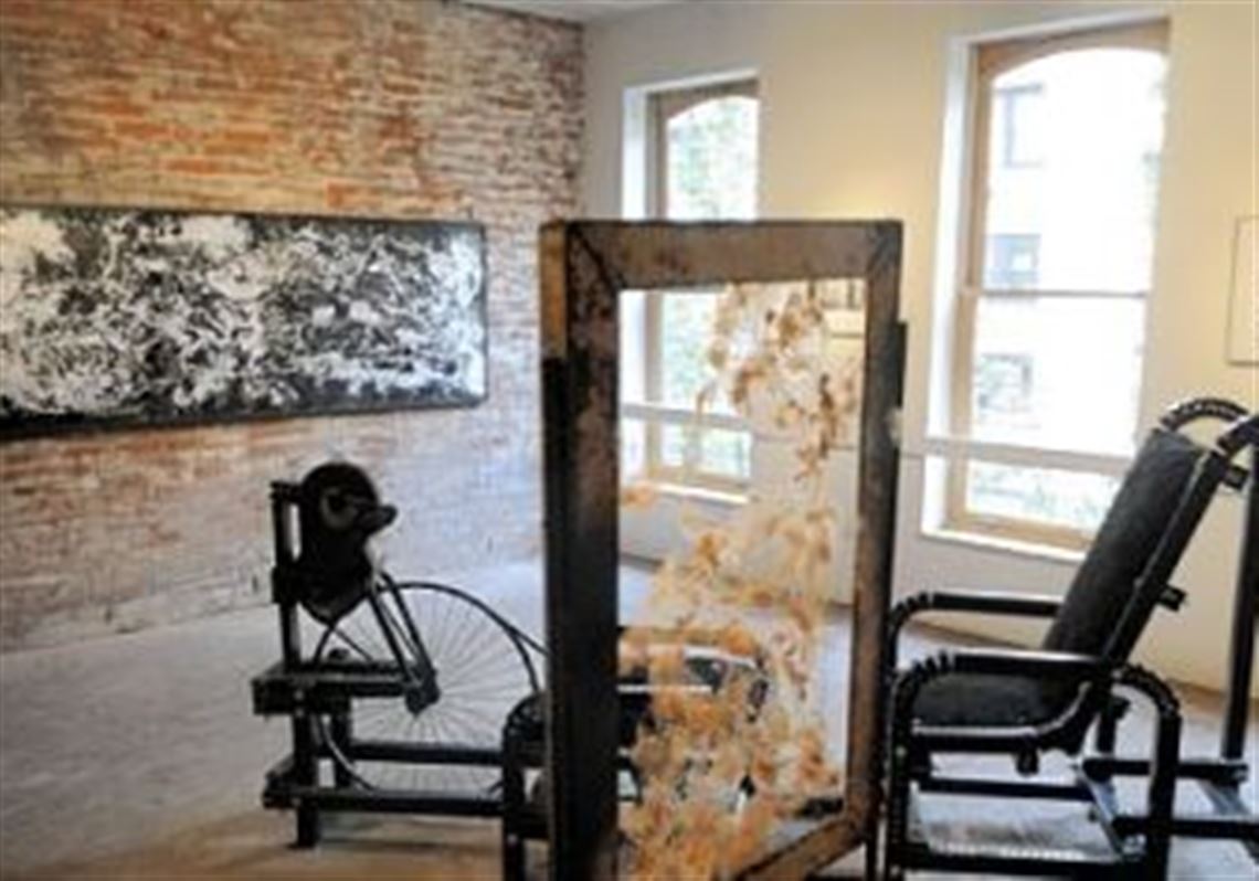Jacob Brown "Untitled"; center foreground: Sonya Seitz "Obstructed Window"; center background: Pat Lamut "Peddle Power" are all part of the Three Rivers Arts Festival's Juried show.