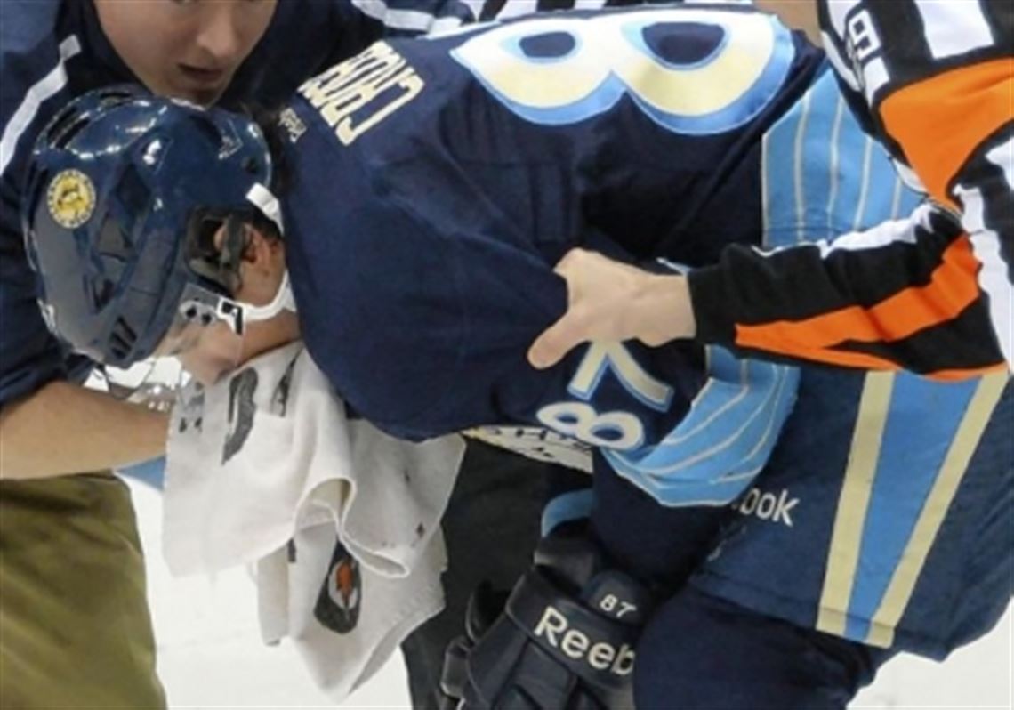 Injured Penguins center Sidney Crosby met with the team and reporters on Monday to talk about his broken jaw.
