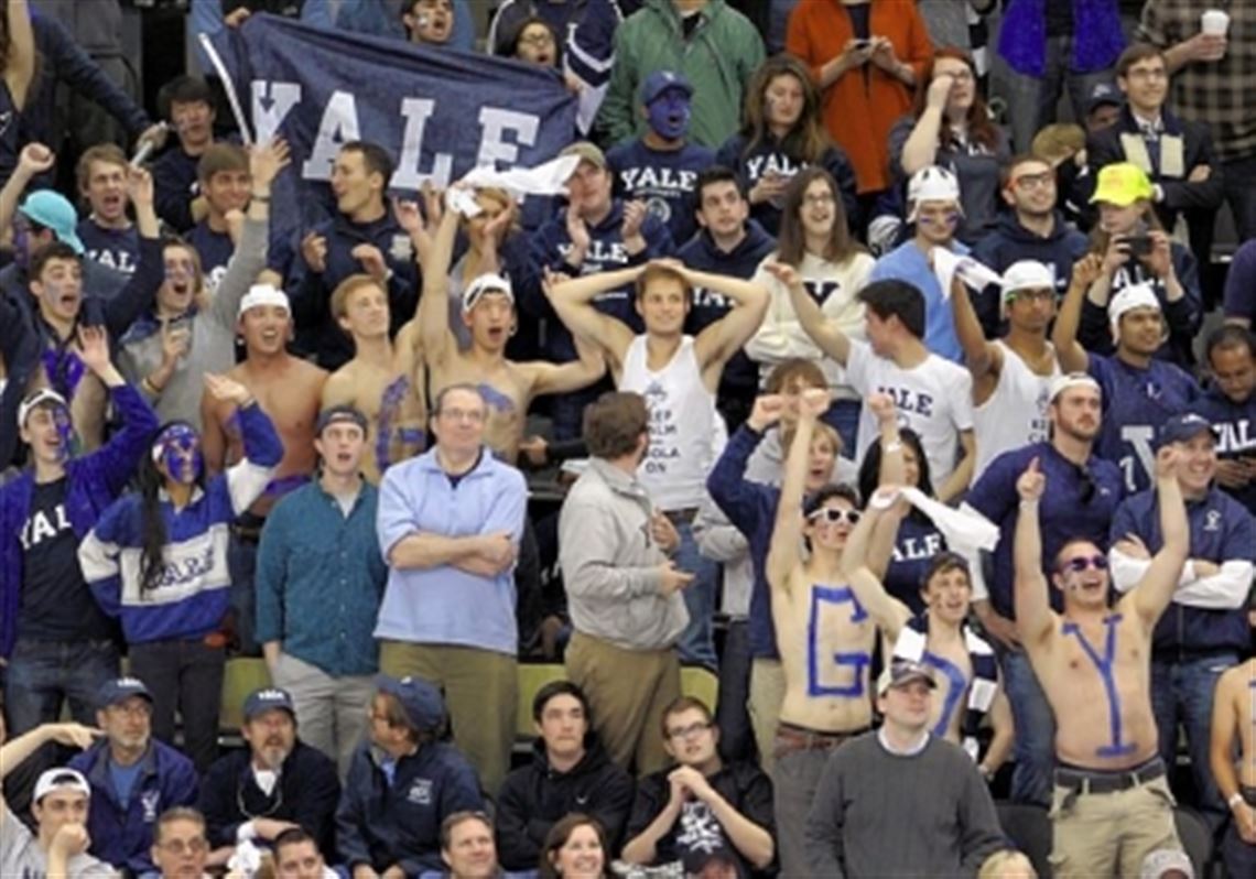 Yale fans cheer in the Frozen Four championship Saturday at Consol Energy Center. Because the event was a success, Robert Morris officials would like to bring it back in the future.