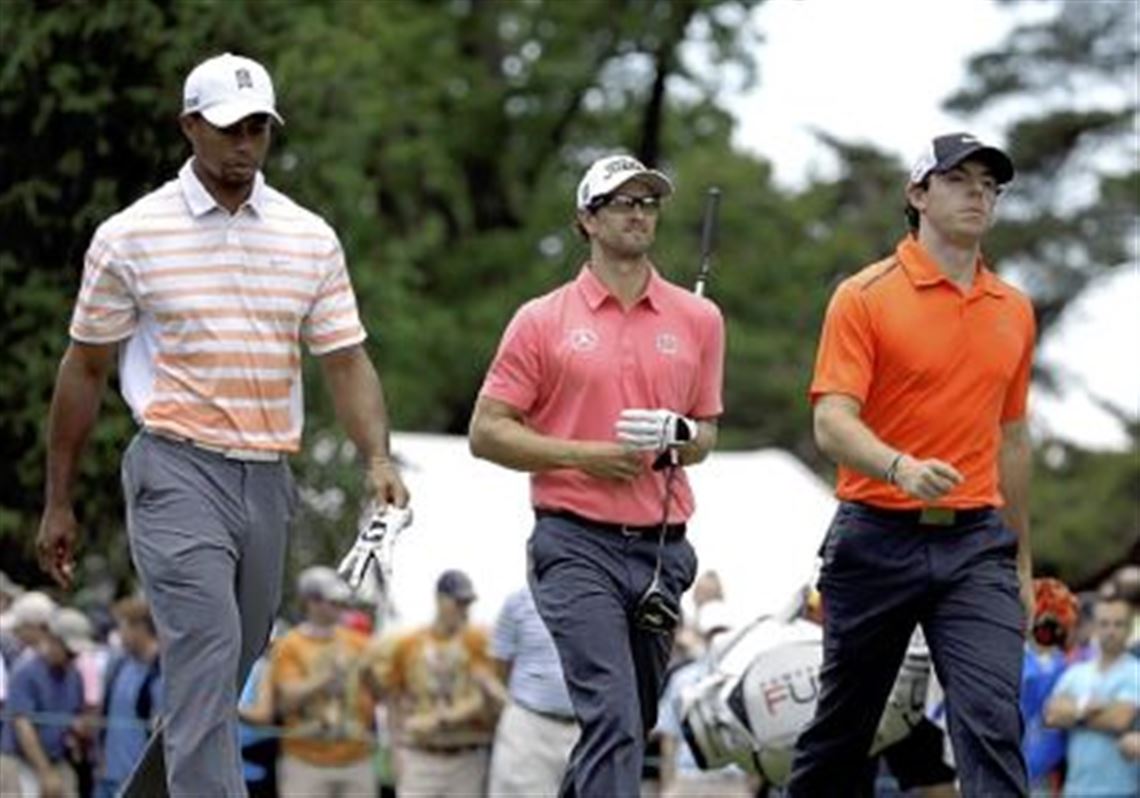 The world's top 3 players From left, Tiger Woods, Adam Scott and Rory McIlroy walk down from the fourth tee box Friday during the second round of the U.S. Open at Merion Golf Club in Ardmore, Pa.