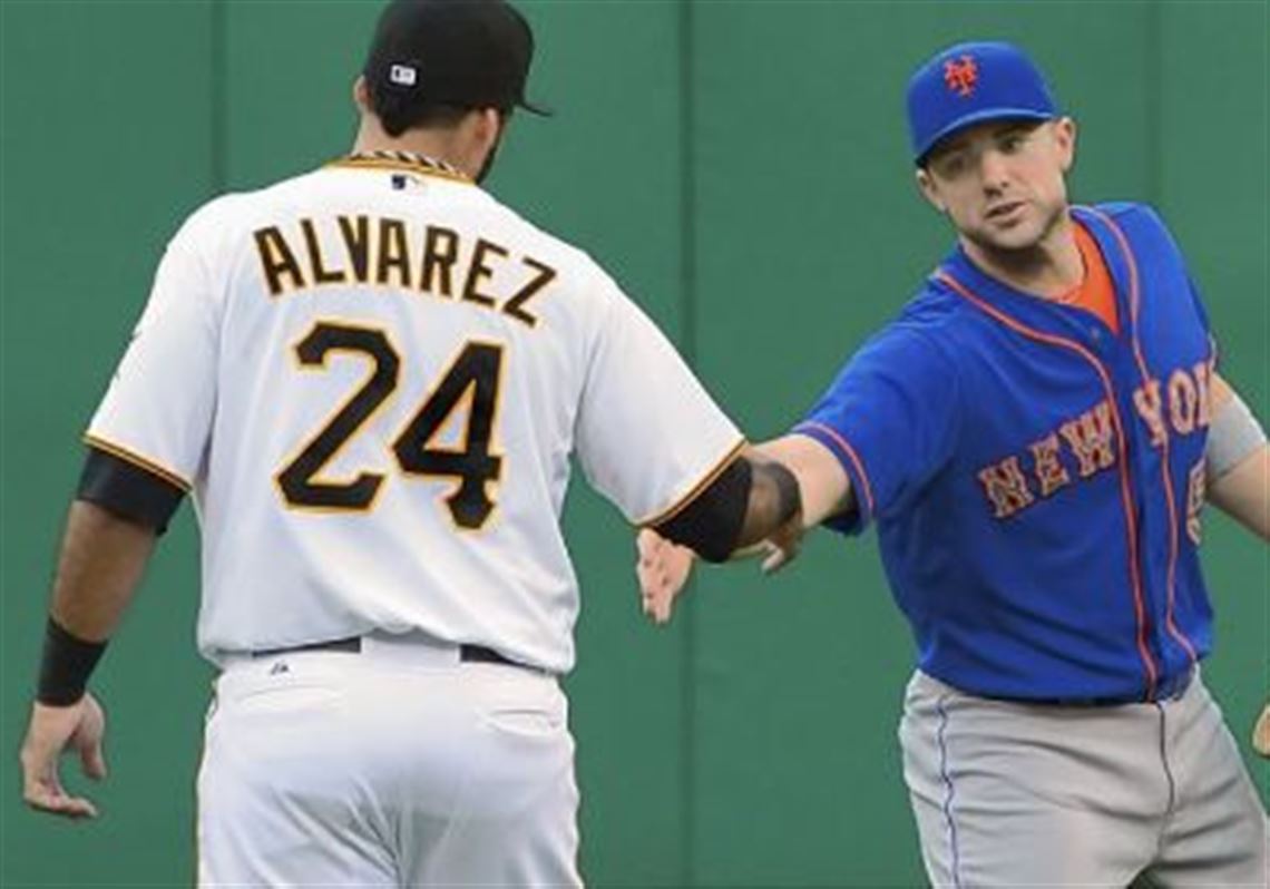 National League All-Star third basemen Pedro Alvarez and David Wright greet each other before the Pirates' 3-2 win Friday night.