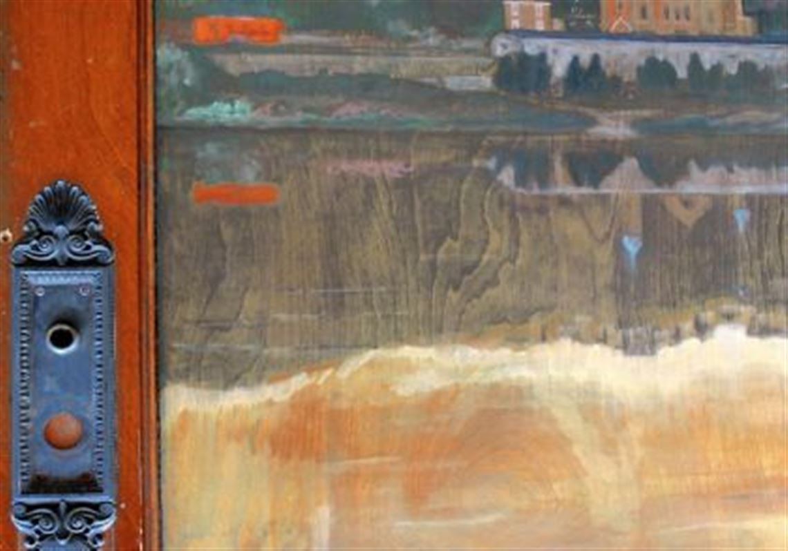 Cory Bonnet painted a scene of the now-demolished St. Nicholas Church on Route 28 on an old door.