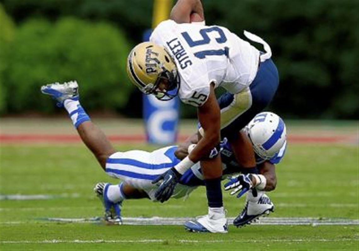 Devin Street is tackled by Duke's Garett Patterson Saturday after making a reception.