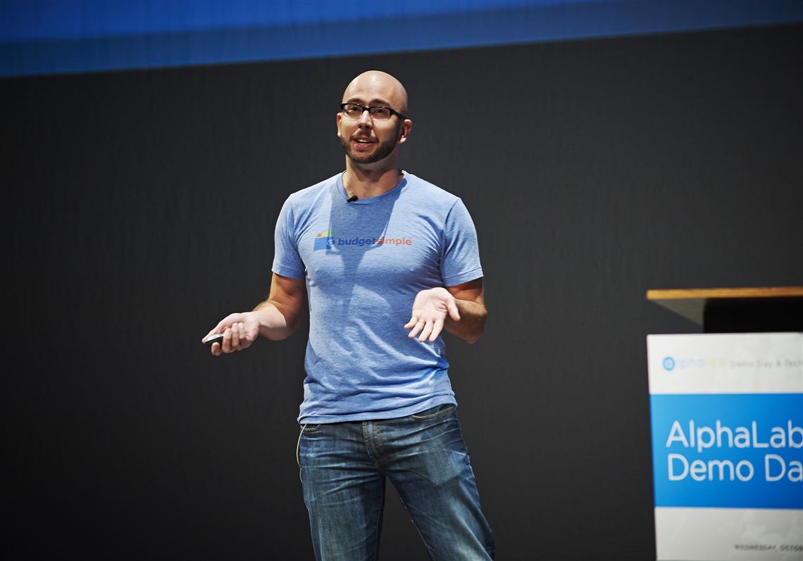 Phil Anderson, CEO of Budget Simple, pitches his company to more than 400 guests during Alpha Lab's Demo Day and Technology Preview