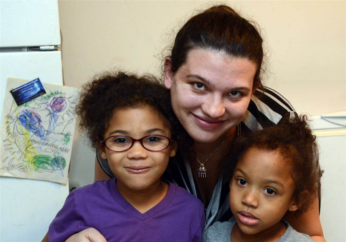 Nicole Kepler with her daughters Cheyanne Kepler-Rose, left, 5, and Jayda Rose, 3, at their home in Arlington.
