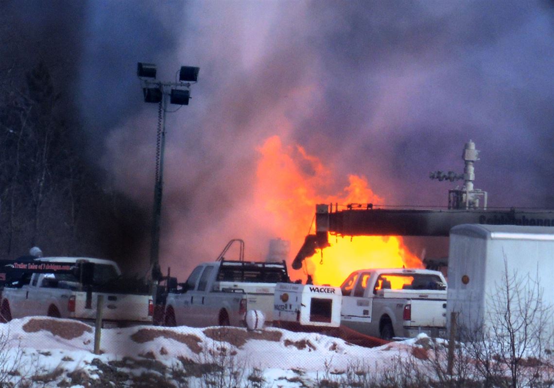 Plumes of smoke billow as a fire rages at a Chevron gas site in Greene County.