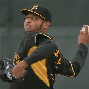 Pirates pitcher Stolmy Pimentel delivers in a spring training bullpen session in Bradenton, Fla.
