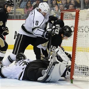 No goal: The referees ruled that the Penguins' Brandon Sutter interfered with Kings goalie Martin Jones in the third period. 