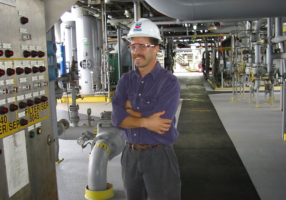 Joel Haight in the control room of an off shore oil rig in West Africa in 2002. 