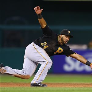 Third baseman Pedro Alvarez  fields a ground ball in the fourth inning Tuesday night in St. Louis.
