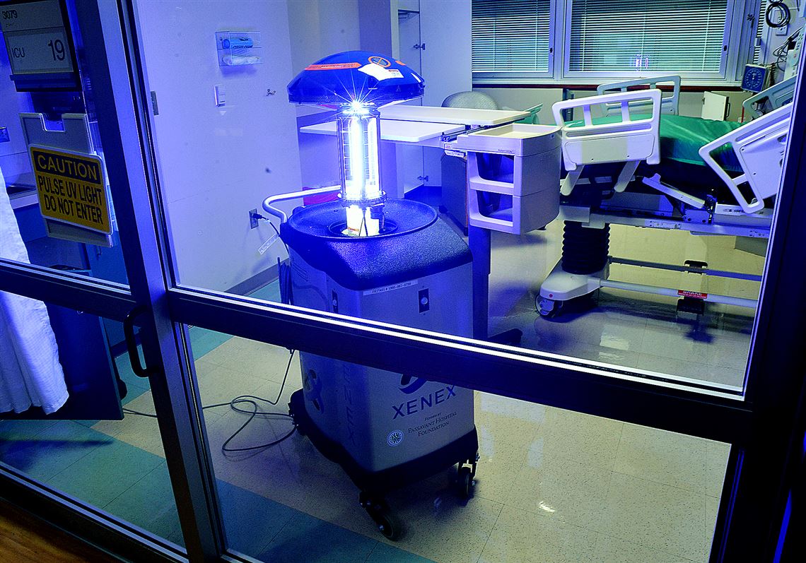 "Violet," the latest of UPMC's collection of disinfecting robots which uses ultraviolet light to sanitize a hospital's operating and patient rooms, is demonstrated at UPMC Passasvant.