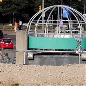 Signage for the Civic Arena marquee stands near piles of rubble during demolition operations.