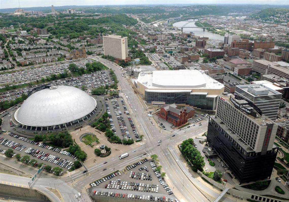 Seen in 2010, the Lower Hill District development area encompasses, from left, Mellon Arena, Washington Plaza apartments, Consol Energy Center with the Epiphany Church in front, and Chatham Center.