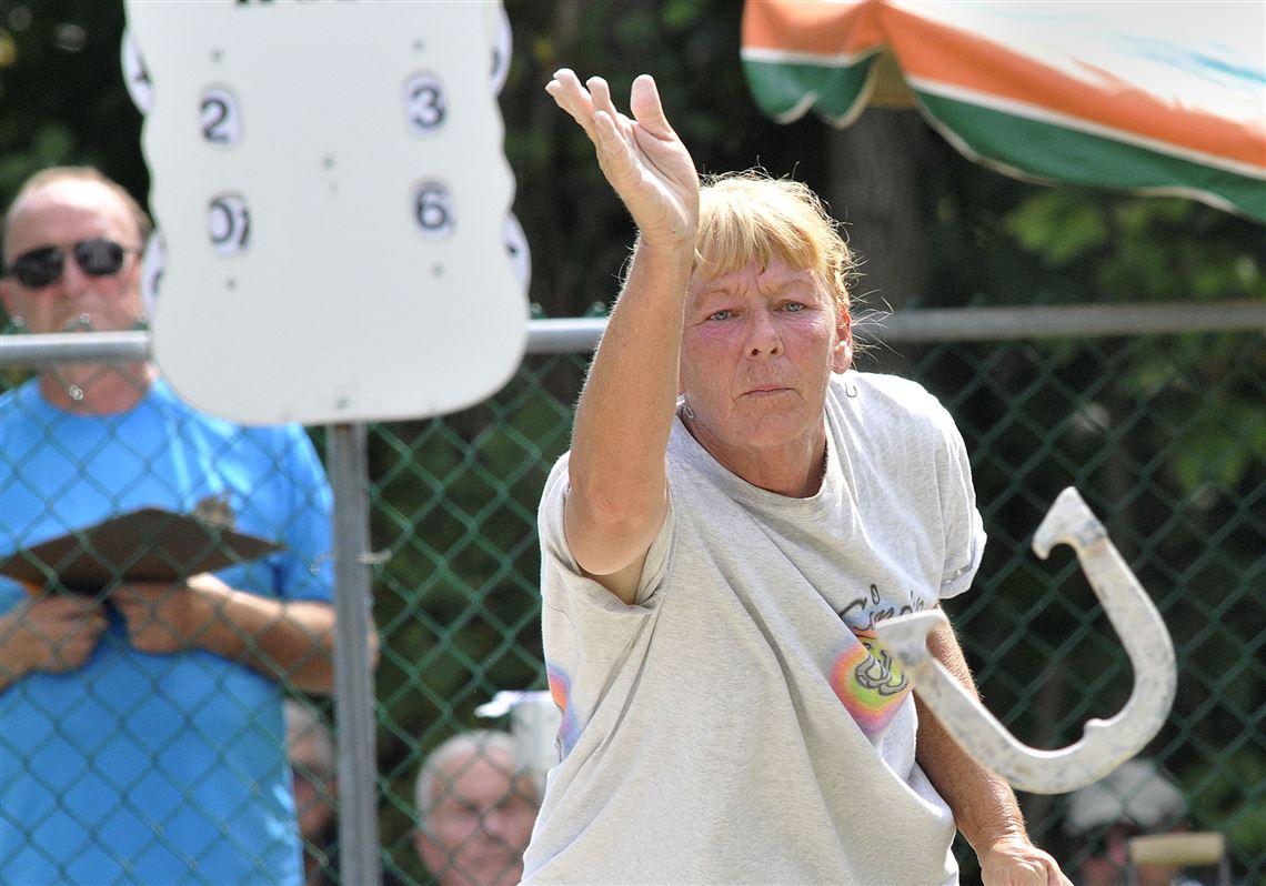 Cindy Hoffman of Mount Washington pitches a horseshoe Sunday at the finals of the state horseshoe championships. This year marks the first since 1949 that the championships are being held in Pittsburgh. In her first game, Cindy beat Nina Hammer of State College, 45-23