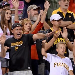 Pirates fans cheer their team.