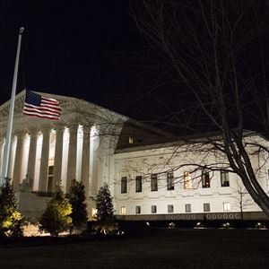 A U.S. flag flies at half-staff in front of the U.S. Supreme Court in Washington Saturday after is was announced that Supreme Court Justice Antonin Scalia, 79, had died. 