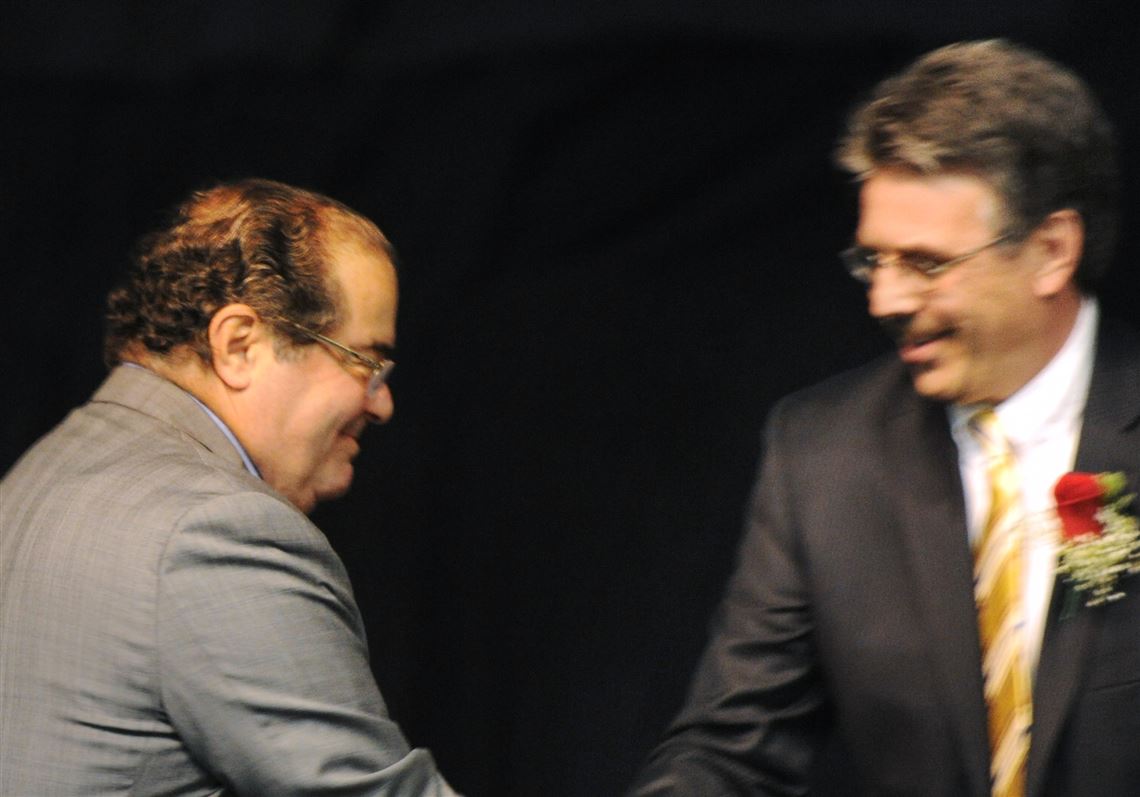 Justice Antonin Scalia delivered the keynote address at the Palumbo Center for Duquesne University's law school's centennial in 2011. He was greeted by Ken Gormley, the 11th dean of Duquesne University School of Law.