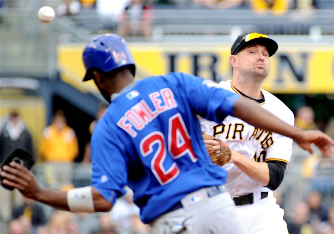 Cubs center fielder Dexter Fowler breaks up a double play attempt by Jordy Mercer in the third inning Wednesday at PNC Park.