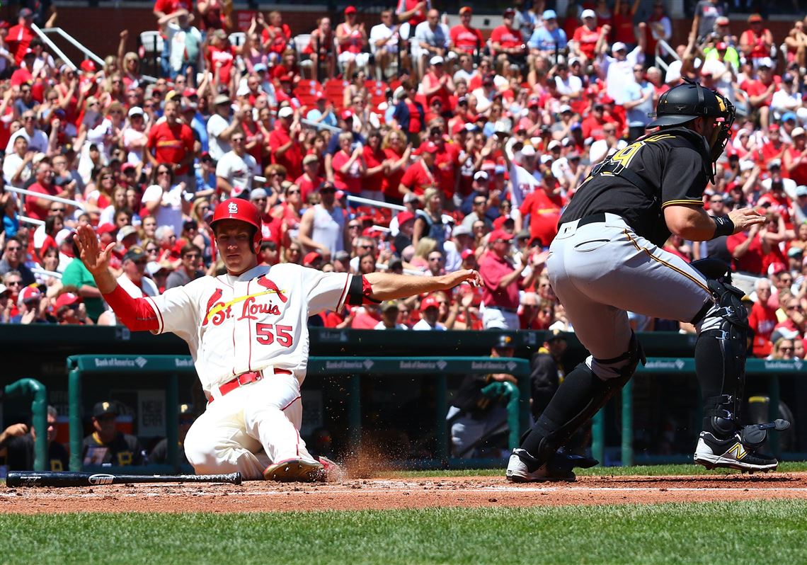ST. LOUIS, MO - MAY 7: Stephen Piscotty #55 of the St. Louis Cardinals scores a run against the Pittsburgh Pirates in the first inning at Busch Stadium on May 7, 2016 in St. Louis, Missouri.  