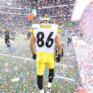 Steelers wide receiver Hines Ward walks off the field thru confetti after losing Super Bowl XLV at Cowboys Stadium in Arlington, Texas.