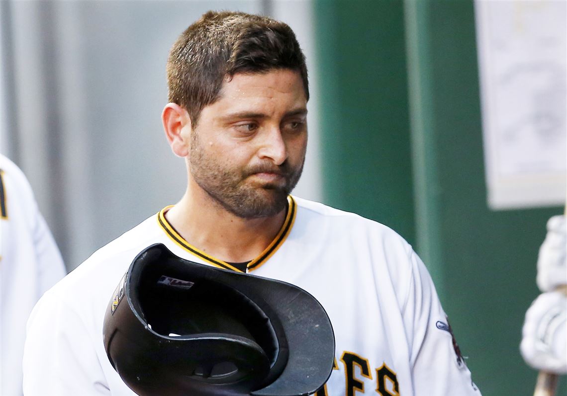 Pirates' Francisco Cervelli flips his helmet as he walks into the dugout after leaving the baseball game against the St. Louis Cardinals during the fourth inning Friday at PNC Park. 