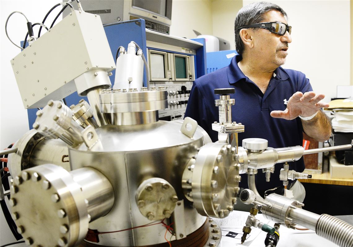 Mehrooz Zamanzadeh , or “Dr. Zee," says many pipeline companies don't know what materials were laid underground decades ago. This Auger electron microscope at Exova in Robinson helps decode the mystery.