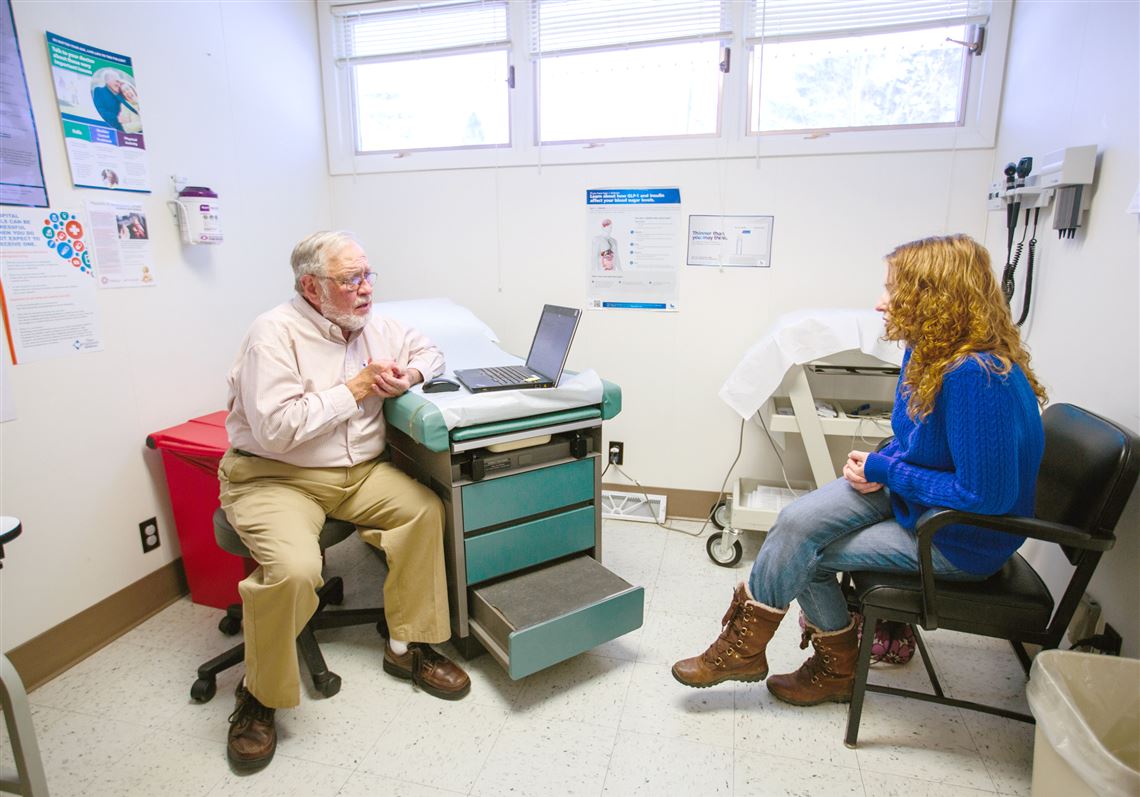 Dr. Paul Harvey meets with a patient at Marienville Family Health in Marienville, Pa. Dr. Harvey is currently the only physician practicing in Forest County.