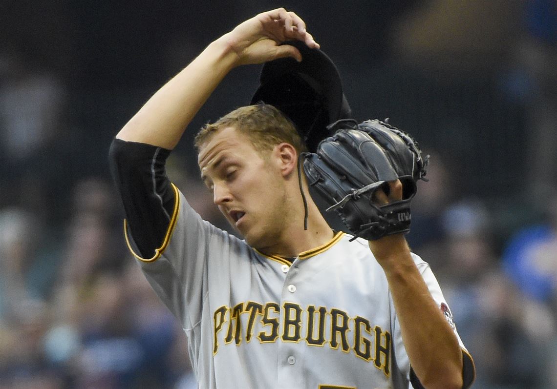 Pirates pitcher Jameson Taillon reacts after giving up four runs during the first inning Aug. 27 in Milwaukee. 