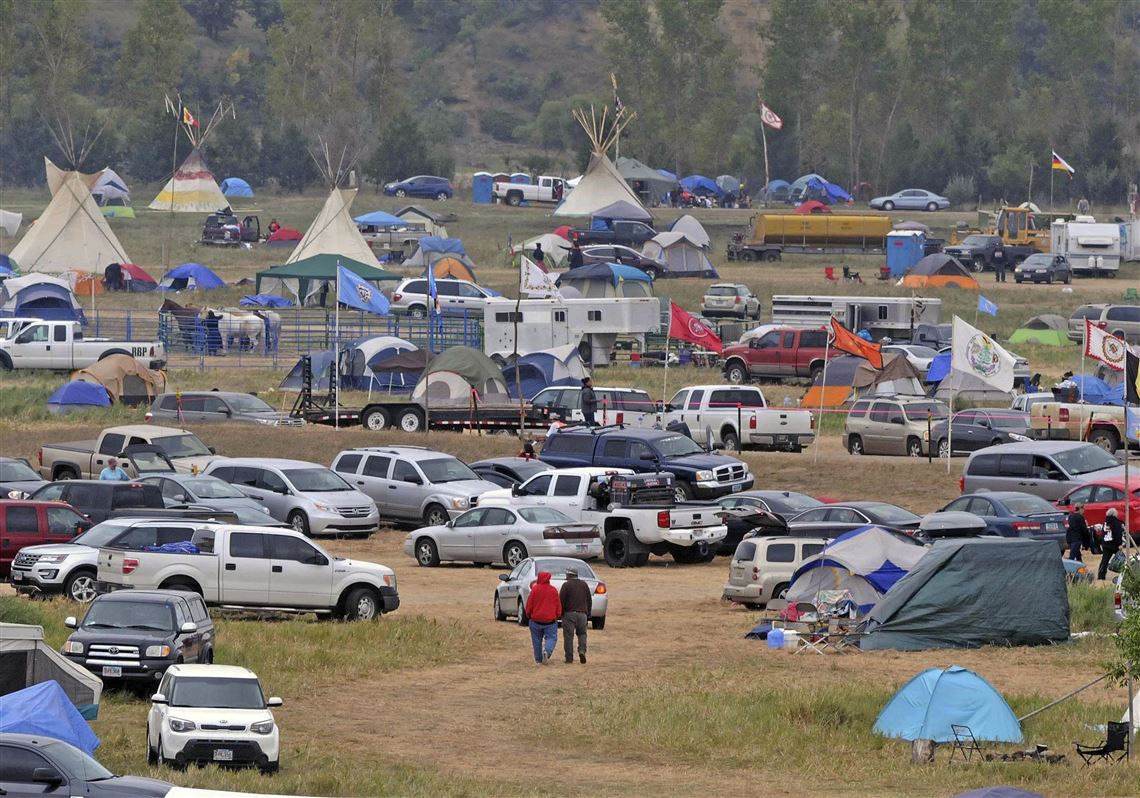 The Sacred Stones Overflow Camp is growing in size and number as more people arrive at the site along North Dakota Highway 1806 and across the Cannonball River from the Standing Rock Sioux Indian Reservation, Monday, Sept. 5, 2016 in Morton County, N.D.  (Tom Stromme/The Bismarck Tribune via AP)