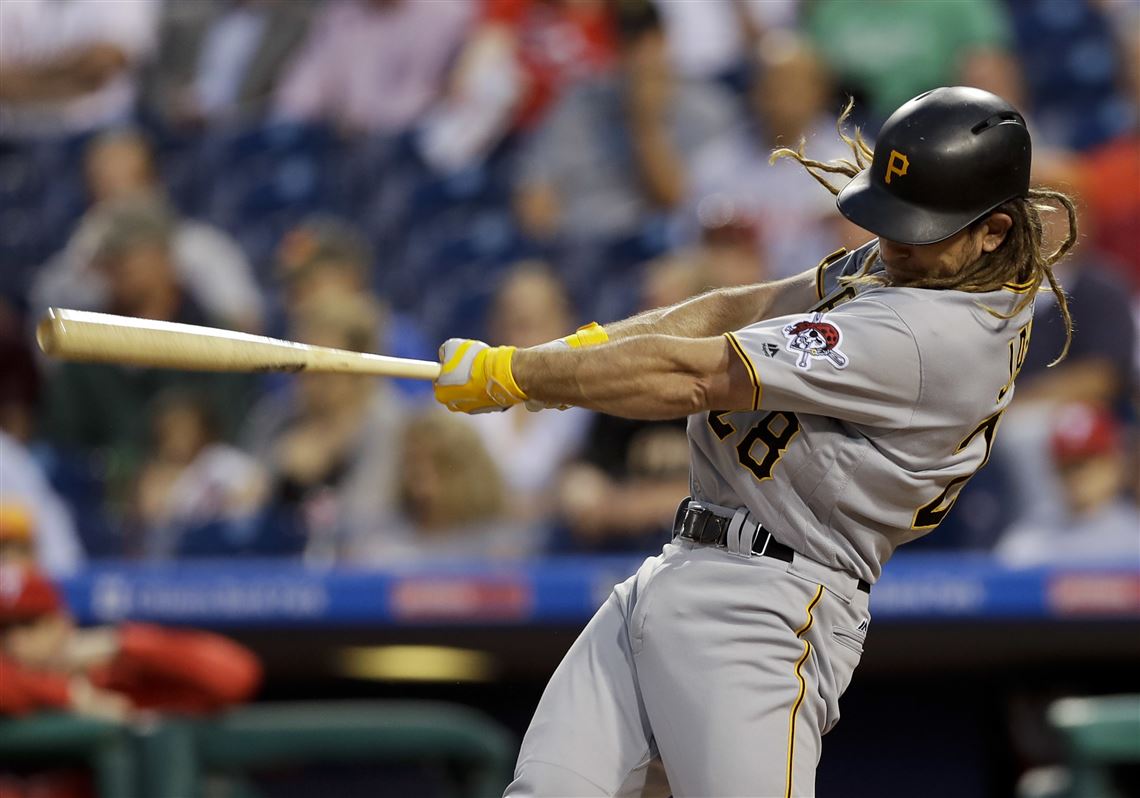 Pittsburgh Pirates' John Jaso follows through on a home run off Philadelphia Phillies starting pitcher Jerad Eickhoff during the first inning of a baseball game, Thursday, Sept. 15, 2016, in Philadelphia. 