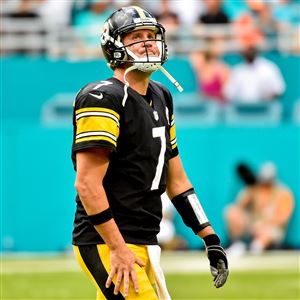 Steelers quarterback Ben Roethlisberger walks off the field after a three and out in the fourth quarter against the Dolphins Sunday at Hard Rock Stadium.