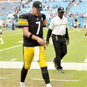 Steelers quarterback Ben Roethlisberger walks off the field after losing to the Dolphins 30-15 Sunday at Hard Rock Stadium.