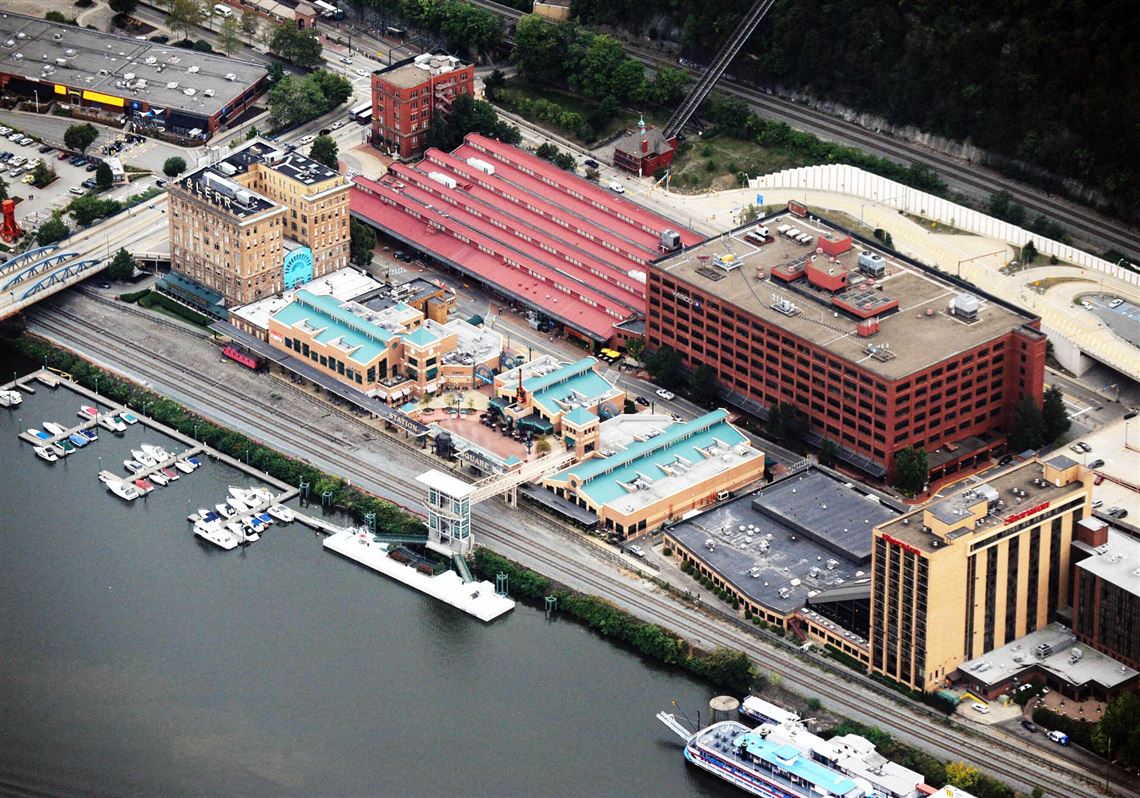 An aerial photograph of Station Square in 2012. Trammell Crow Co. hopes to start construction of an apartment complex in the area to the left of the Smithfield Street Bridge.