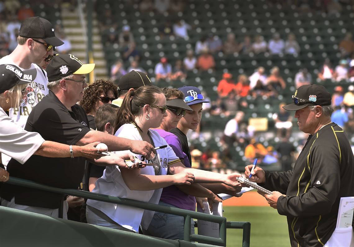 Pirates manger Clint Hurdle signs autographs March 13, 2016, at McKechnie Field in Bradenton, Fla. 