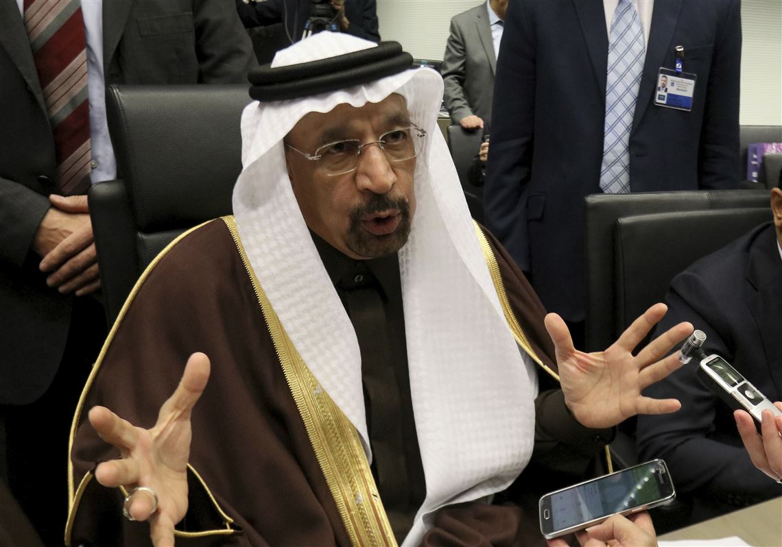 Khalid Al-Falih Minister of Energy, Industry and Mineral Resources of Saudi Arabia speaks to journalists prior to the start of a meeting of the Organization of the Petroleum Exporting Countries, OPEC, at their headquarters in Vienna, Austria, Wednesday, Nov. 30, 2016. (AP Photo/Ronald Zak)