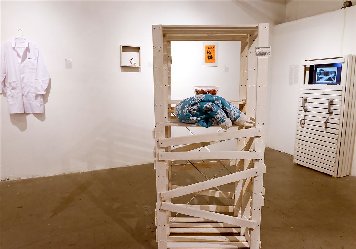 Items on display at the Museum of Broken Relationships, an exhibit of artifacts from relationships and the stories behind them at The Mine Factory in North Point Breeze. Foreground is: "Blanket. September 1, 2015-September 25, 2016. Pittsburgh, USA. 'To me, elephants represent the long-delayed but always expected thing that I live for. I thought he was my elephant. Now I know that my elephant was leaving him.' 
