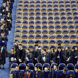 Graduates file into the Peterson Events Center for the 2015 University of Pittsburgh graduation.