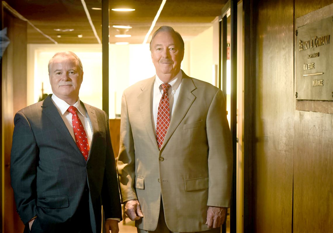 Rich Beynon, left, is president of Beynon & Co., a Downtown real estate and insurance firm. Robert Beynon is the company's chairman and CEO.