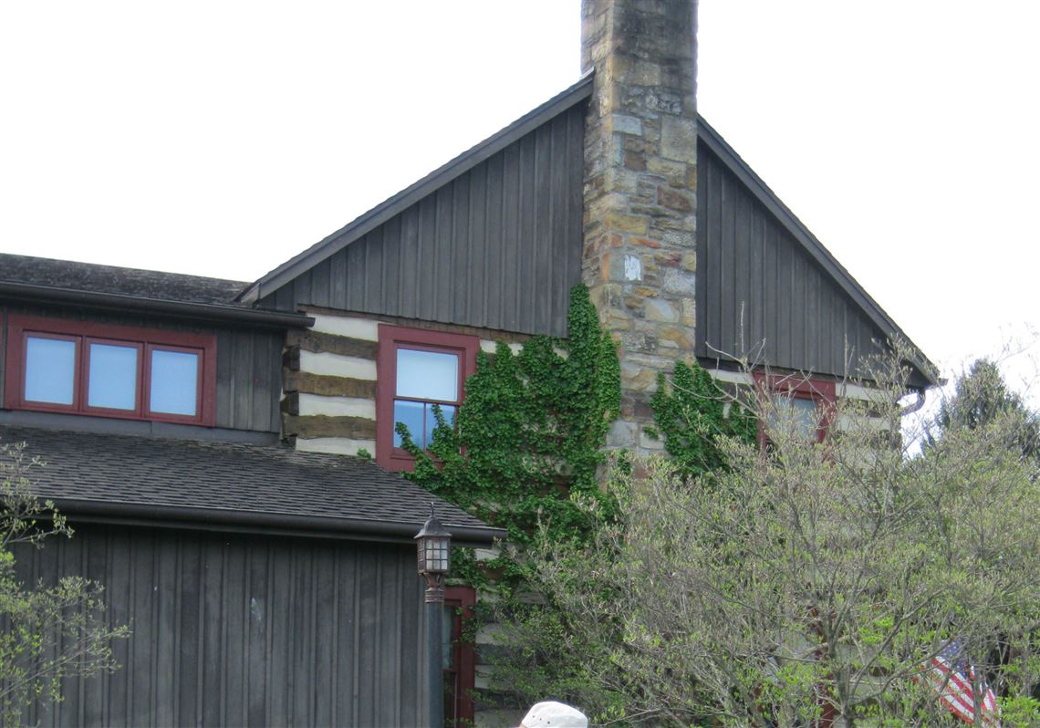 An artist paints plein air at the Southern Alleghenies Museum of Art at Ligonier Valley.