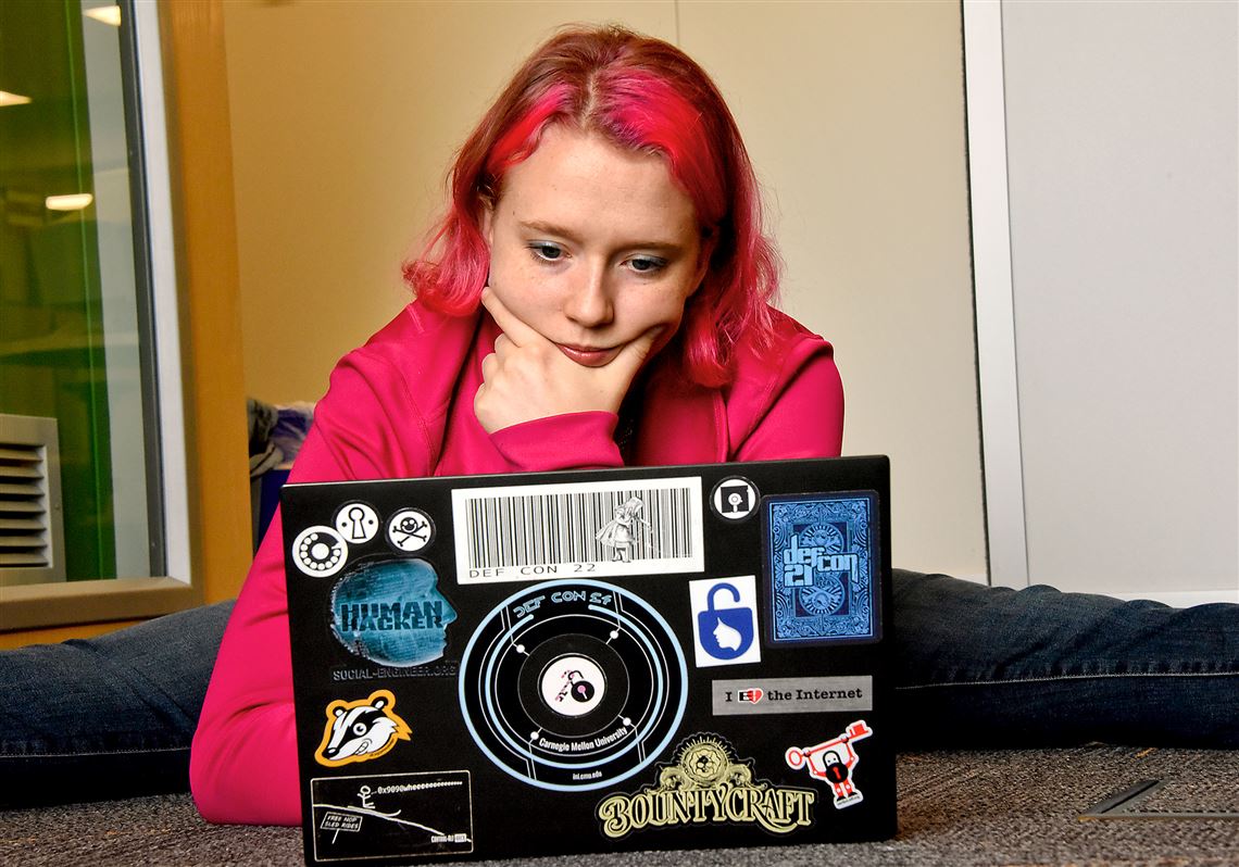 Melanie Rich-Wittrig, a graduate student  in computer security and a member of CMU's world-dominant hacking team, looks at her computer in CyLab at CMU's campus in the Oakland section of Pittsburgh.