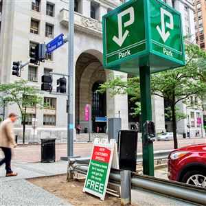 The parking lot across from the City-County Building on Grant Street, Downtown, may become the site of a mixed-use development. The owner of the lot, InterPark Holdings, is looking for a partner for the project. A parking garage would be part of the development.