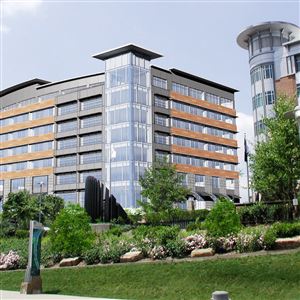 A rendering of a seven-story office building planned by Continental Real Estate Companies for the North Shore riverfront. Construction is set to start in September.